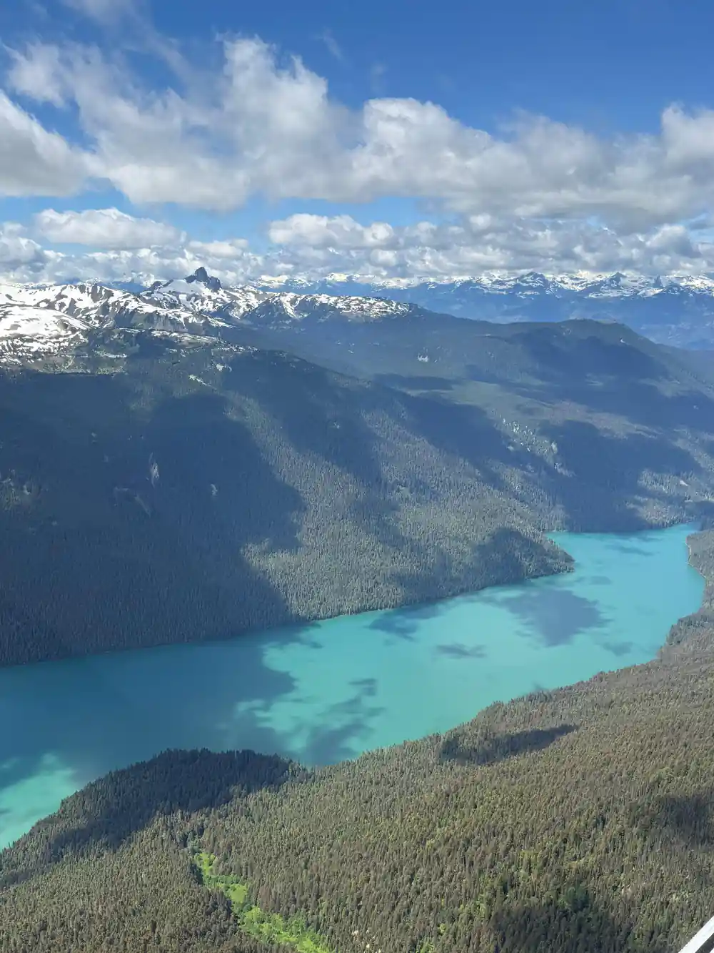 Braided turquoise water at the head of a lake