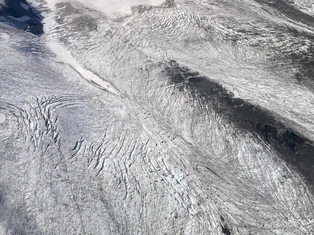 Crevasses across the surface of a glacier