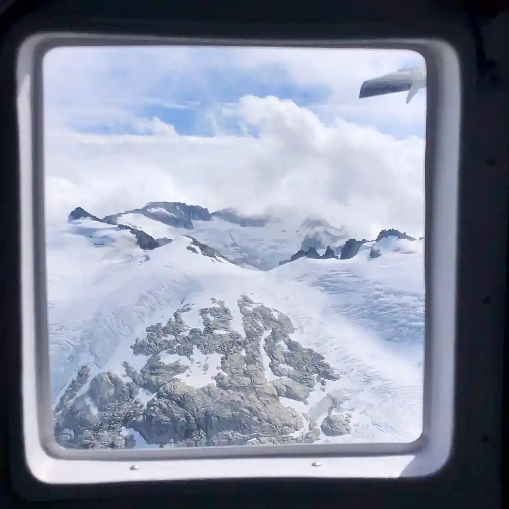 The view out of the cabin window onto a snowfield
